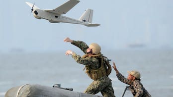 Philippines says US spy planes monitoring China at sea