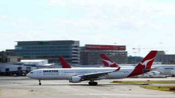 Stomach bug triggers mass vomiting on Qantas flight