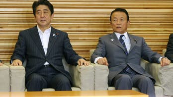 Japan deputy PM rejects resignation calls over Nazi remarks