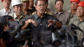 Defiant Cambodian PM vows to lead new government