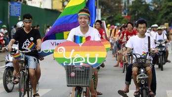 Activists parade for gay rights in Vietnam