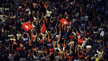 Tunisian police, protesters clash in revolution cradle