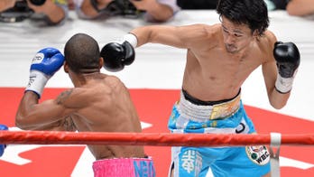 Yamanaka retains crown with first-round KO