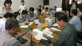 Defiant Cambodian opposition appeals poll results