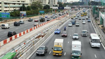 Singapore bus driver fired for nail clipping on the job