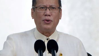 Flowers fell steely Philippine leader