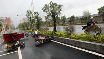 Typhoon death toll rises to eight in Philippines