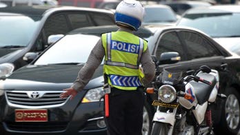 Gunmen shoot dead two policemen in Indonesia