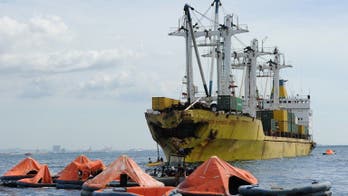 Rough seas hinder Philippine rescuers after sinking