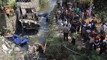 Eighteen dead as Indonesia bus plunges into river