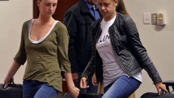 Peru judge remands British, Irish pair in custody