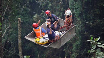 Bus in deadly Malaysia crash was overloaded: reports
