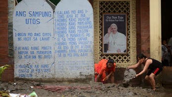 Disaster-weary Philippines mops up after deadly floods