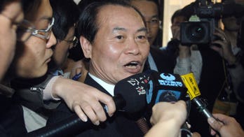 Taiwan minister resigns after influence peddling claim