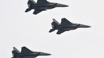 Japan scrambles jets for drone near disputed islands