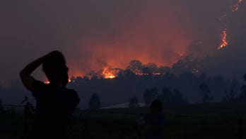 Dozens of bushfires flare in Australia