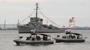 Philippines mulls removing 'Chinese' blocks at shoal