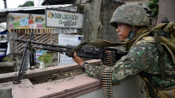 Heavy fighting in rebel-besieged Philippine city
