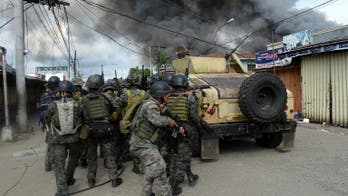 Philippine leader visits war-torn southern city