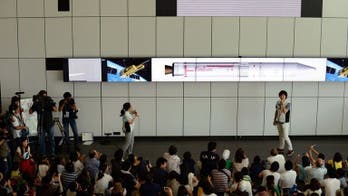 Japan's new rocket blasts off in laptop-controlled launch