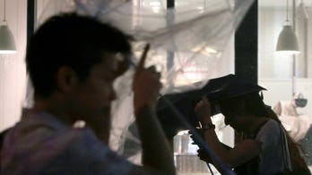 Typhoon Man-yi heads for Japan