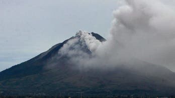 Indonesian volcano erupts forcing 6,000 to flee