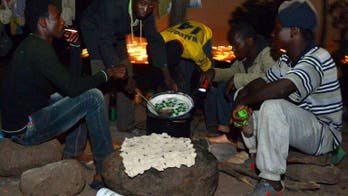 Injured African migrants eye bright lights of Europe