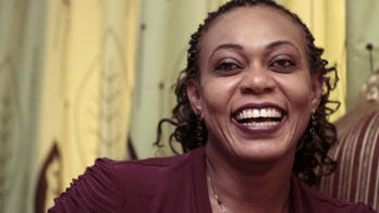 Sudan woman in court for refusing to cover her hair