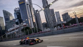Ecclestone says Formula One Singapore IPO still on