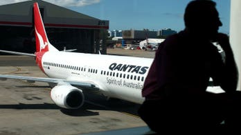 Snake on plane grounds Qantas flight