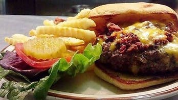 Pizza restaurant owner wants people to get a free meal on him