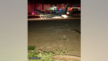 Small plane crash-lands in Dallas parking lot, pilot walks away unharmed