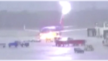 This is the moment an airport worker got struck by lightning