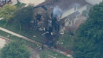 Pilot killed after small plane crashes into northern Illinois home