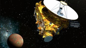 NASA's New Horizons spacecraft wakes up for Pluto encounter in 2015