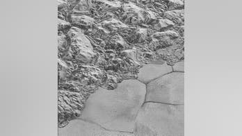 New Pluto photos show breathtaking views of dwarf planet