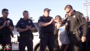 California police escort sister of slain deputy to middle school