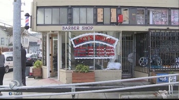 S.F. police replaces barbershop's windows broken during shootout