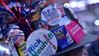 Supreme Court session on political buttons gets testy