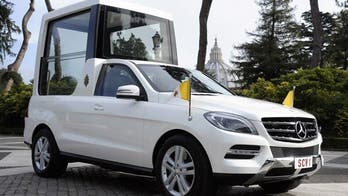 Pope Francis presented with Mercedes M Class-based Popemobile