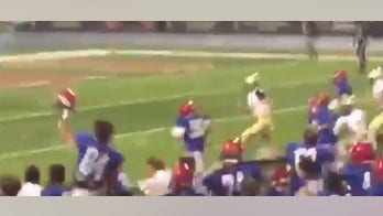 High school senior with Down syndrome scores first touchdown