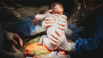 Stunning pics of midwife mom delivering her own baby by C-section