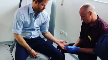 Prince Harry says world must revive urgency in AIDS fight