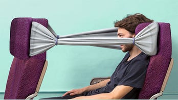 B-Tourist: Giant elastic band gives fliers a little privacy