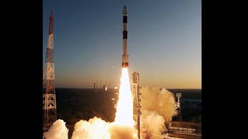 Suitcase-sized satellite launched to hunt asteroids, space junk