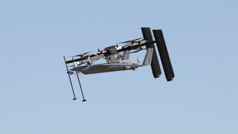 This giant quadcopter drone launches fixed-wing UAVs, then retrieves them with a skyhook