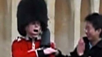 Dramatic video of Queen's Guard as he points gun at annoying tourist