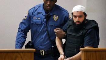 Bombing suspect's lawyer wants shootout charges dropped