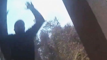 Bodycam captures man's arrest after leap from a 2nd-floor balcony