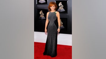 Reba wears white rose to the Grammys: 'Everybody should be treated right'